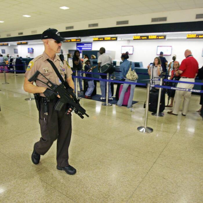 Cop-found-punching-Black-lady-in-the-face-at-Miami-airport-terminal Cop found punching Black lady in the face at Miami airport terminal 