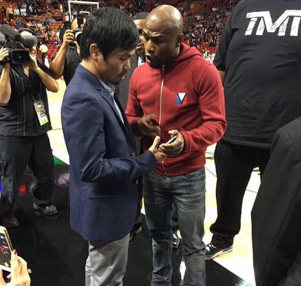 B8Z5-giCEAAgTYN Floyd Mayweather & Manny Pacquiao Exchange Numbers At The Bucks vs. Heat Game In Miami (Photos) 