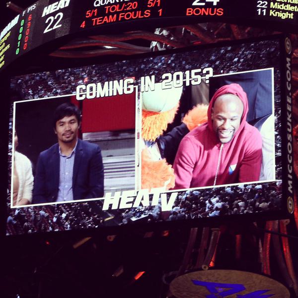 floyd Floyd Mayweather & Manny Pacquiao Exchange Numbers At The Bucks vs. Heat Game In Miami (Photos) 