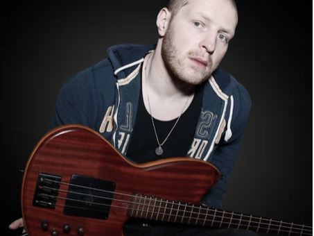 Mike Hall, Bass Virtuoso, Performs Hip Hop to Rock With Unique Style